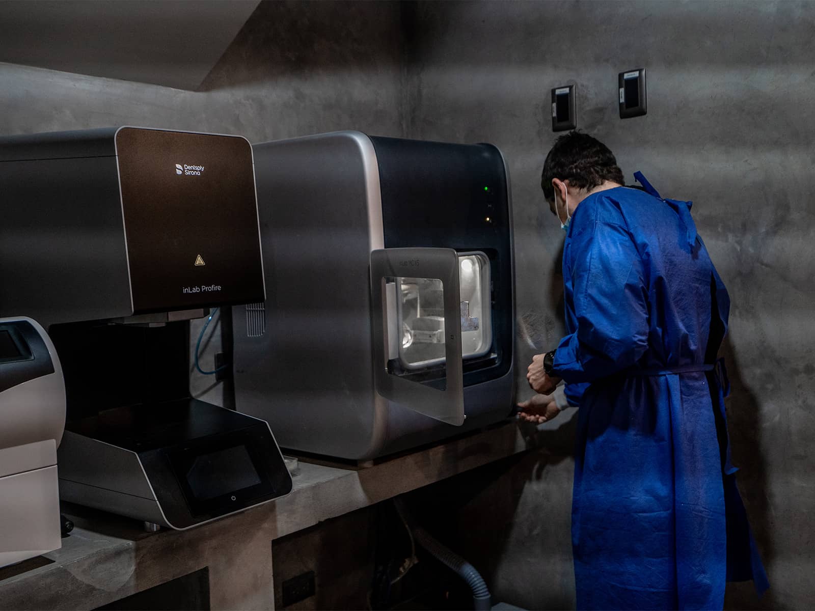 Dentist working in in-house dental laboratory in Cabo, Mexico