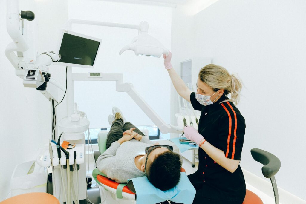 dentist treating a patient in a modern clinic