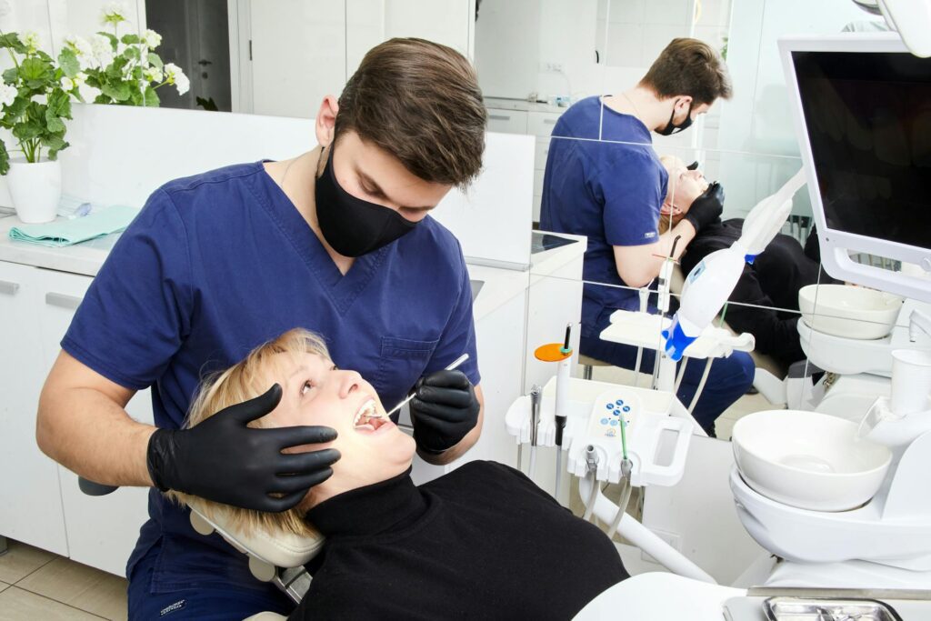 A dentist treating a patient